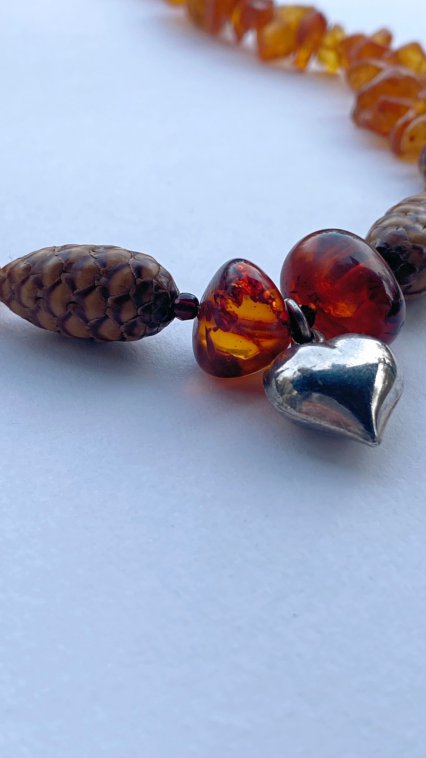 baltic amber, garnet, pinecone and chunky vintage silver heart