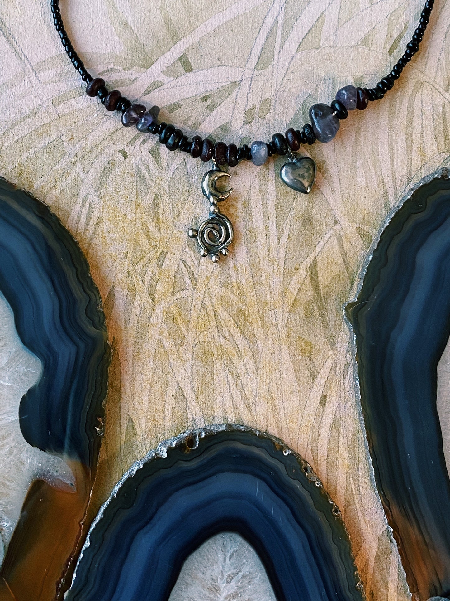 ꩜ volua ꩜ spiral moon dark heart beaded necklace