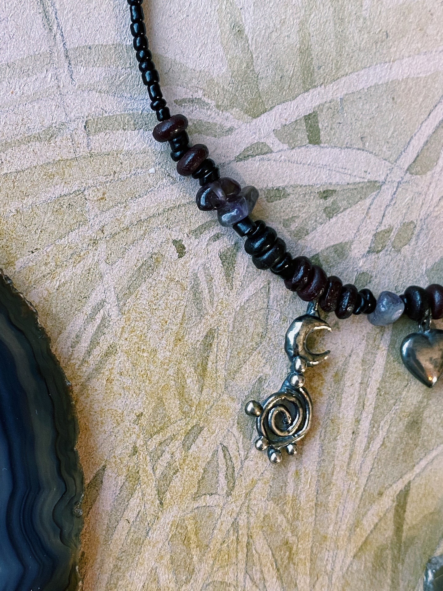 ꩜ volua ꩜ spiral moon dark heart beaded necklace
