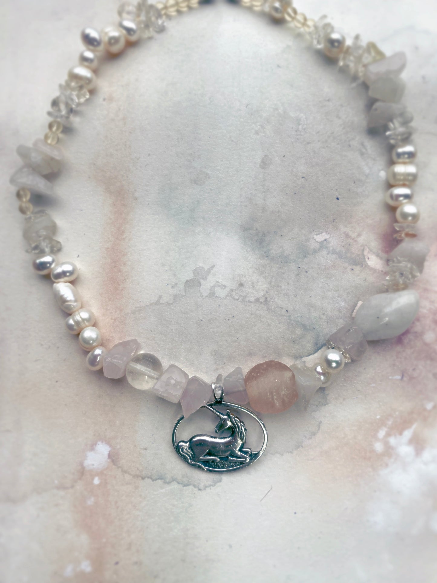 resting unicorn with fresh water pearl, quartz and recycled glass