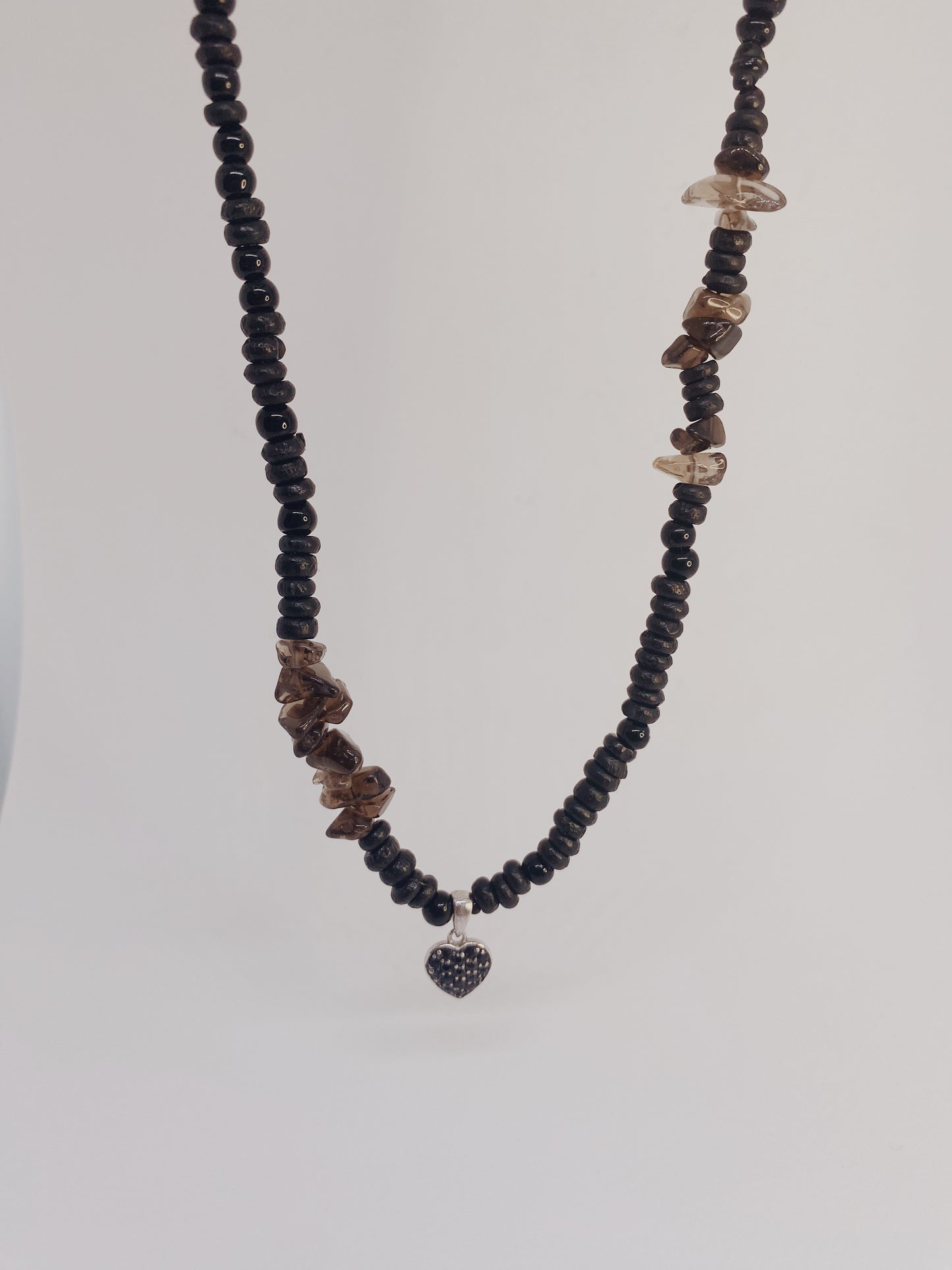smoky quartz and dark glass with vintage heart charm