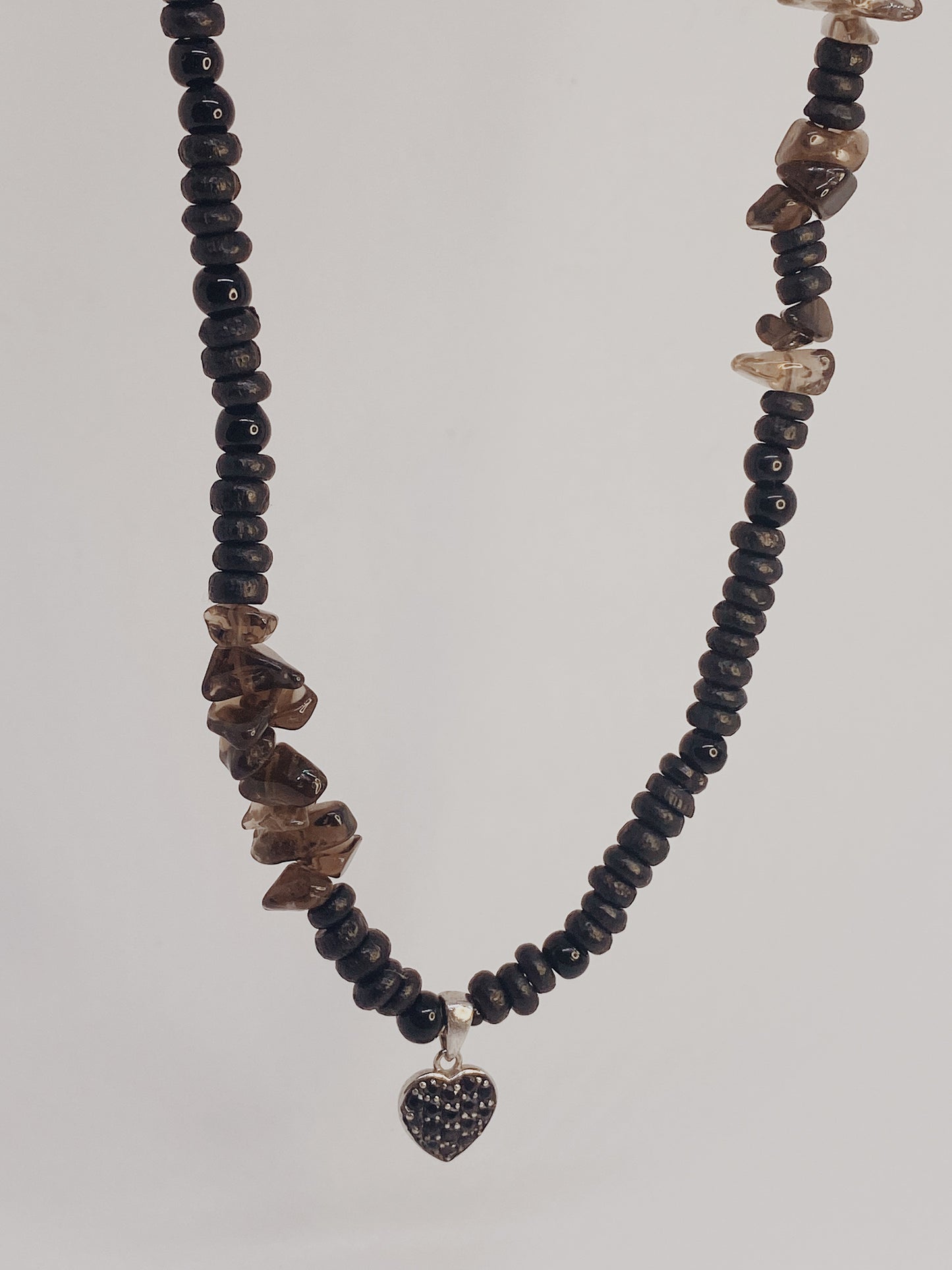 smoky quartz and dark glass with vintage heart charm