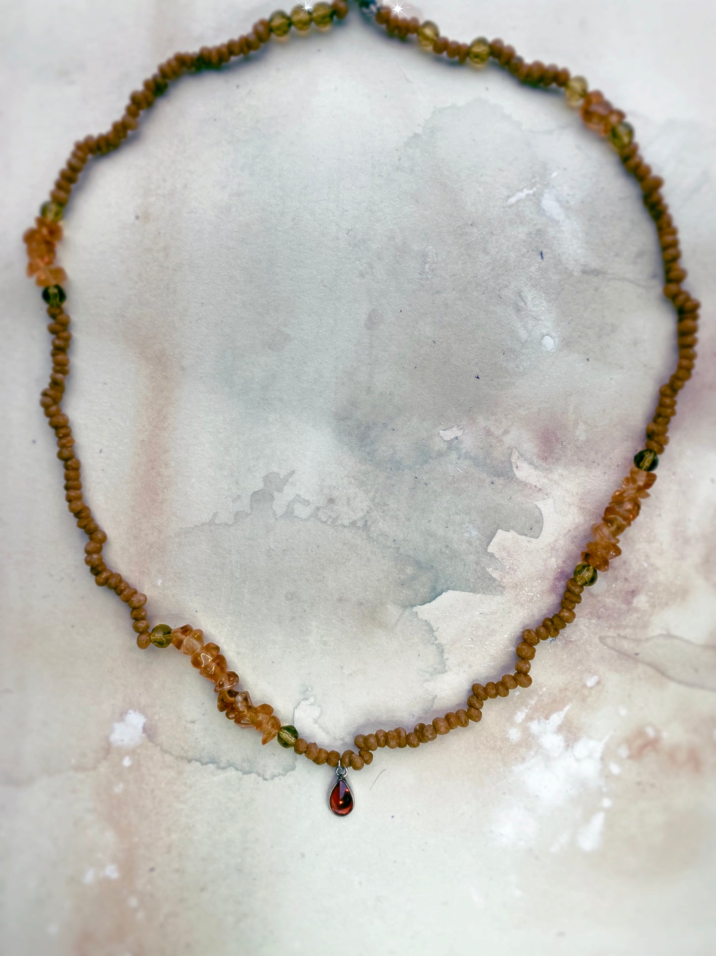 luminous fire droplet with structured citrine, green faceted glass and wood