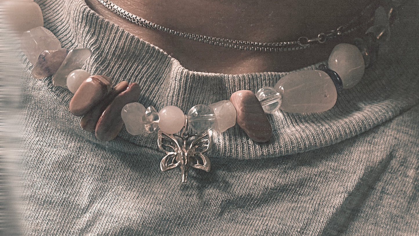 silver moth pendant on chunky textured strand