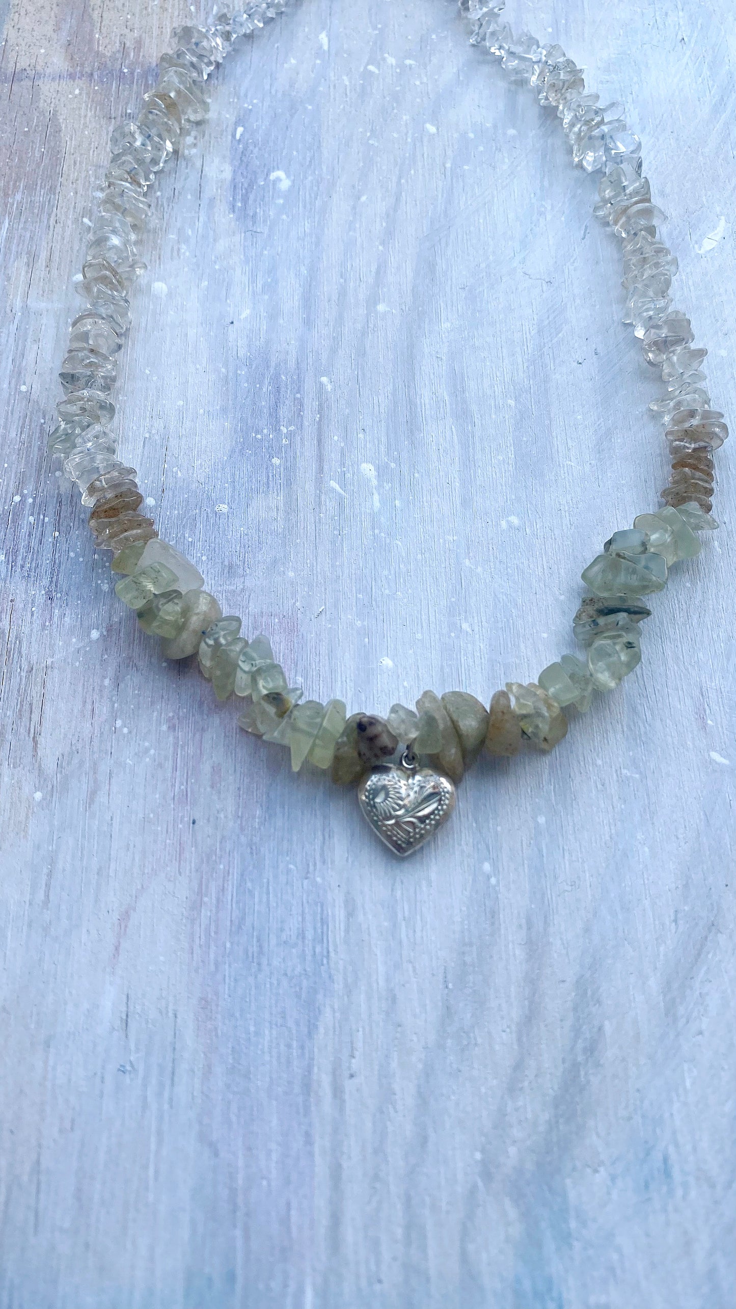 rustic patterned vintage heart on textured gemstone gradient
