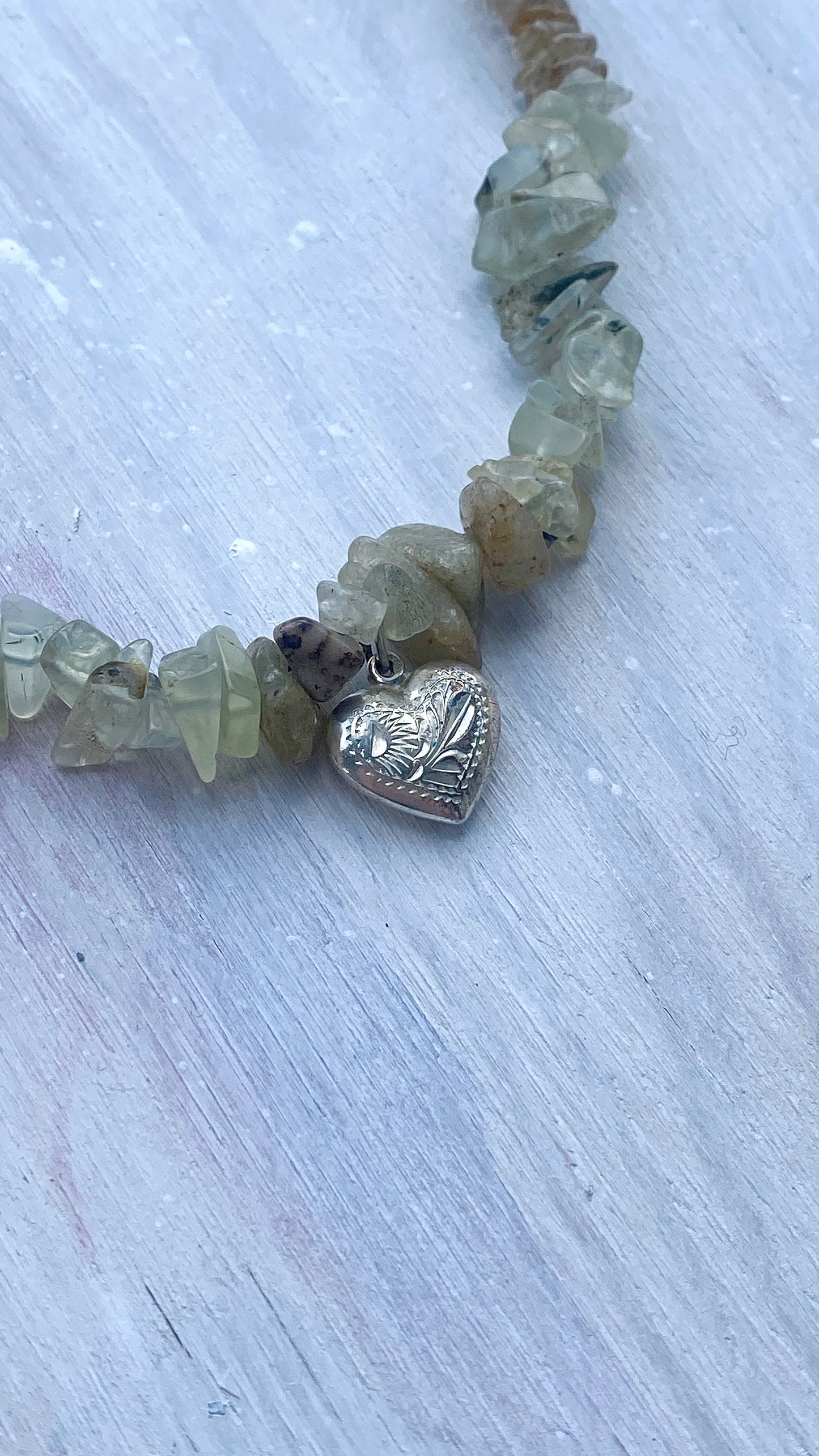 rustic patterned vintage heart on textured gemstone gradient