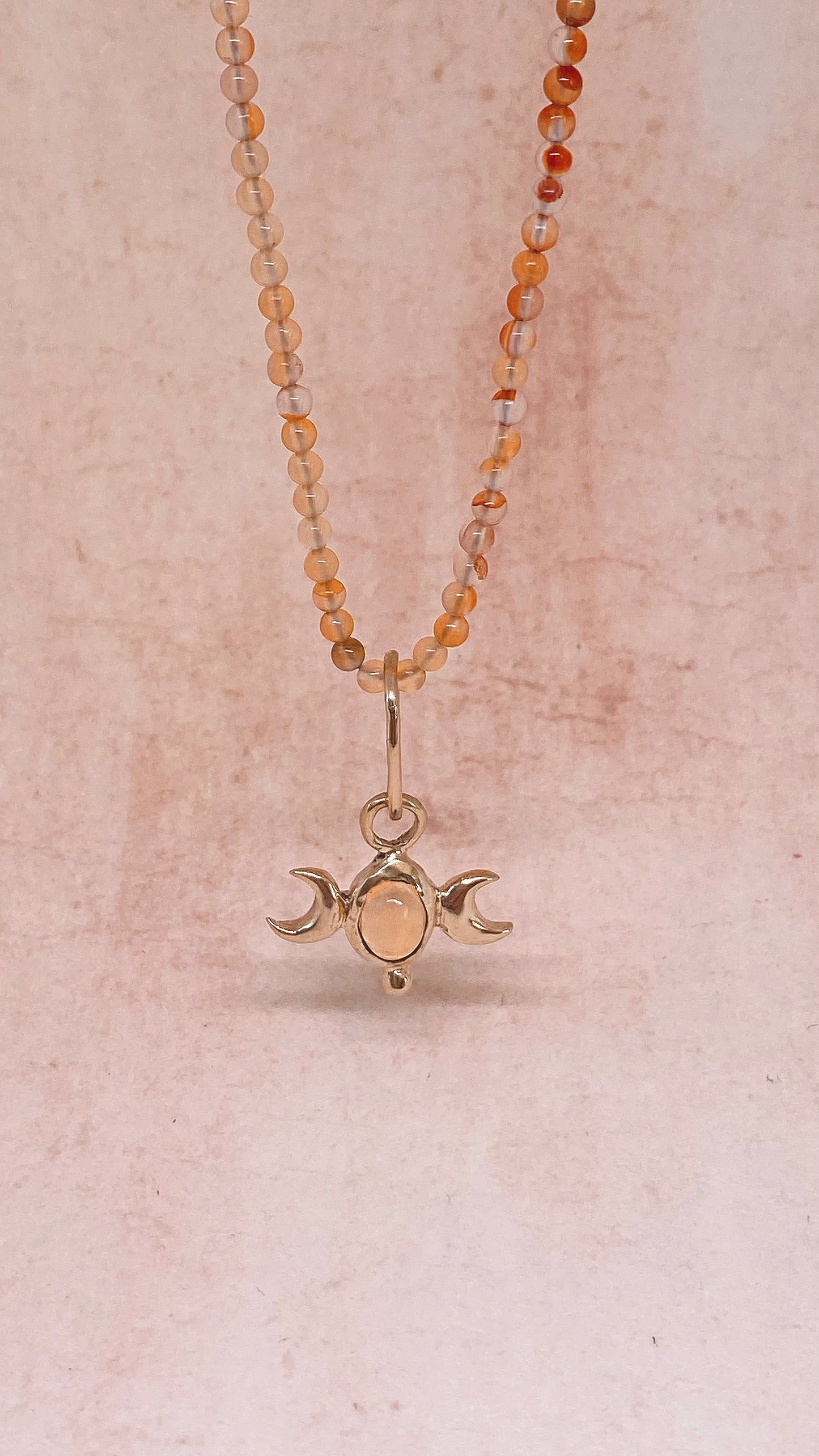 ꩜ volua ꩜ triple moon fire opal on gradient carnelian – unique fire opal and carnelian necklace, handcrafted artisan design, vibrant luxury golden brass