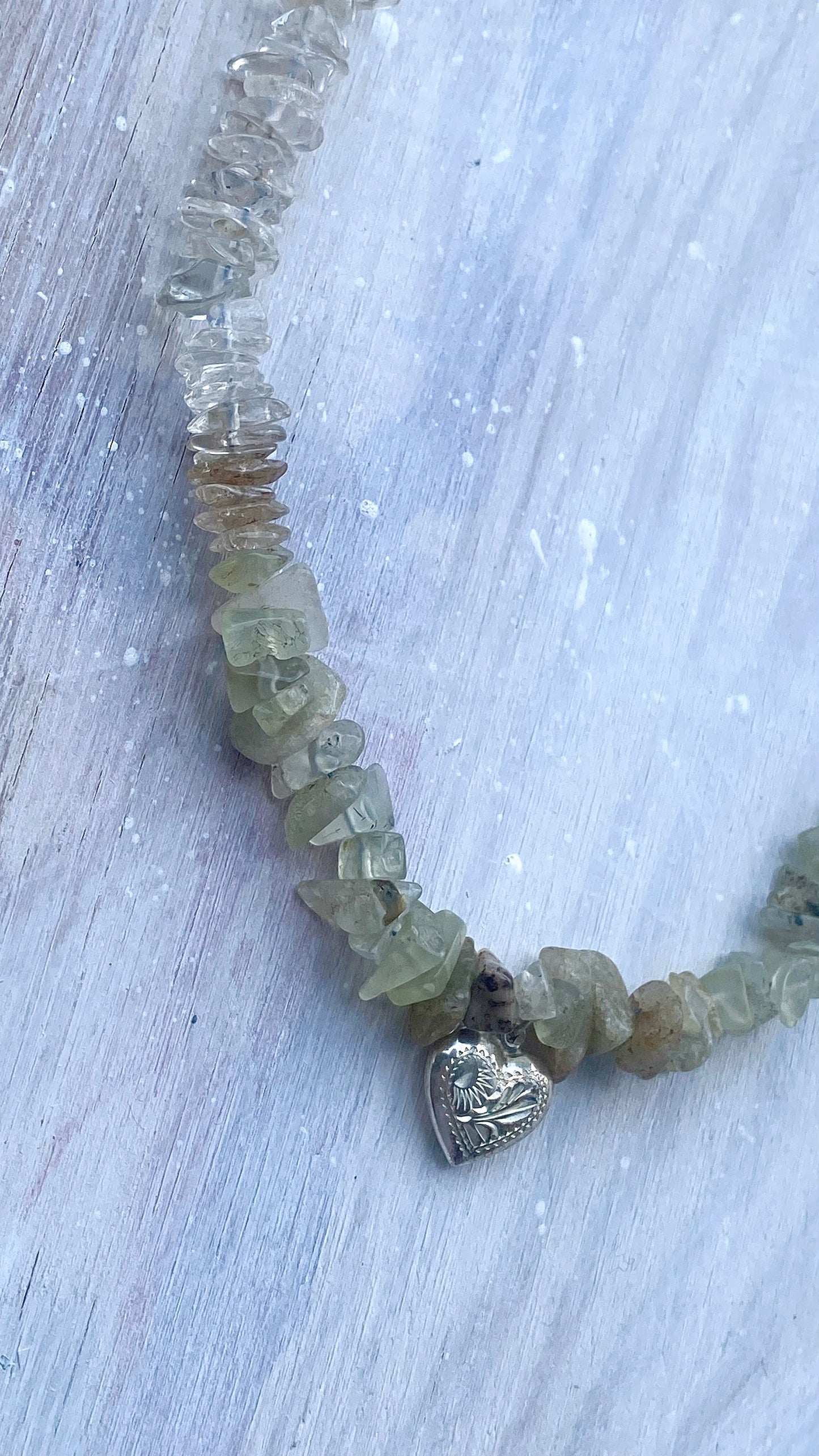 rustic patterned vintage heart on textured gemstone gradient