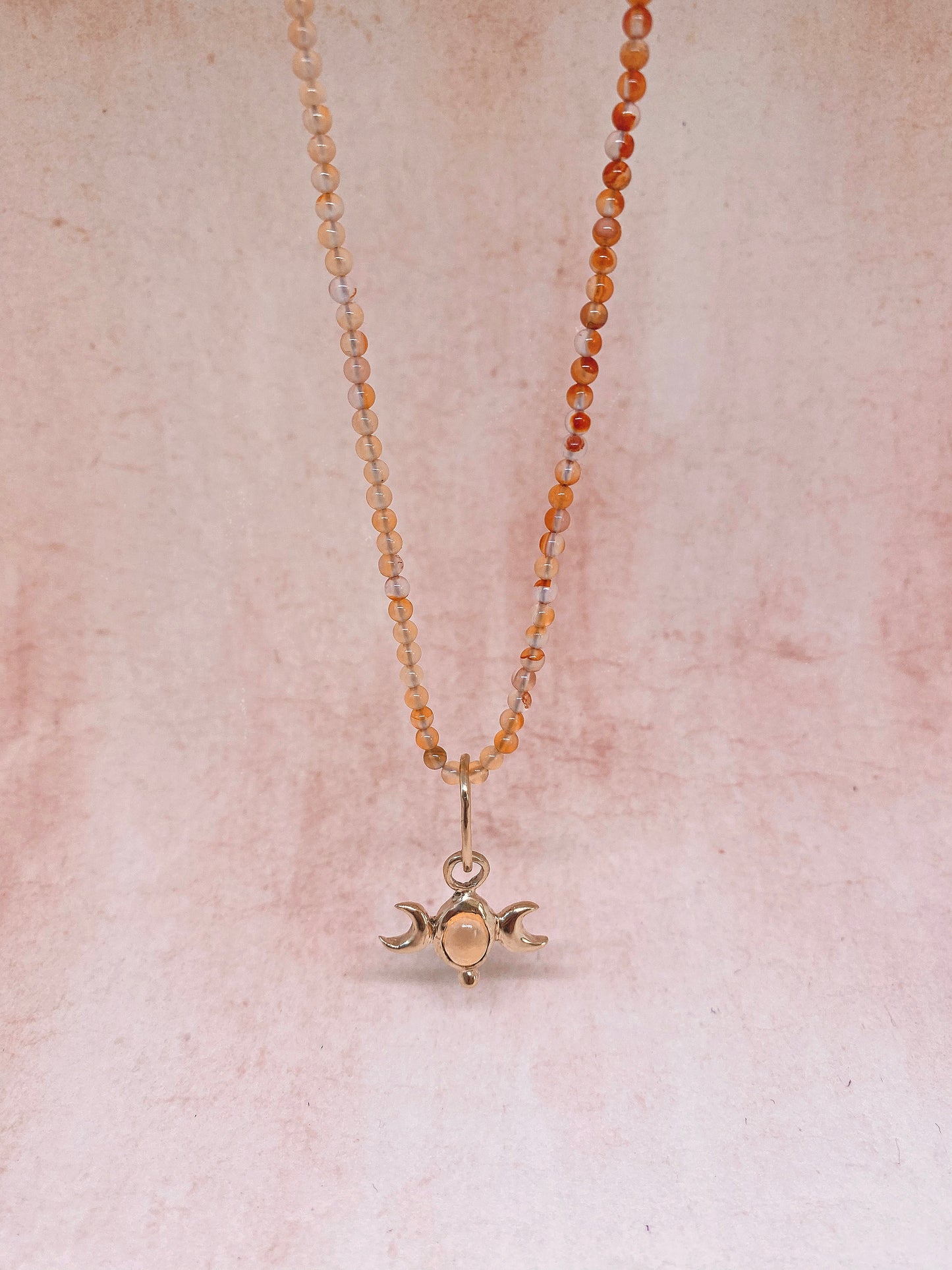 ꩜ volua ꩜ triple moon fire opal on gradient carnelian – unique fire opal and carnelian necklace, handcrafted artisan design, vibrant luxury golden brass