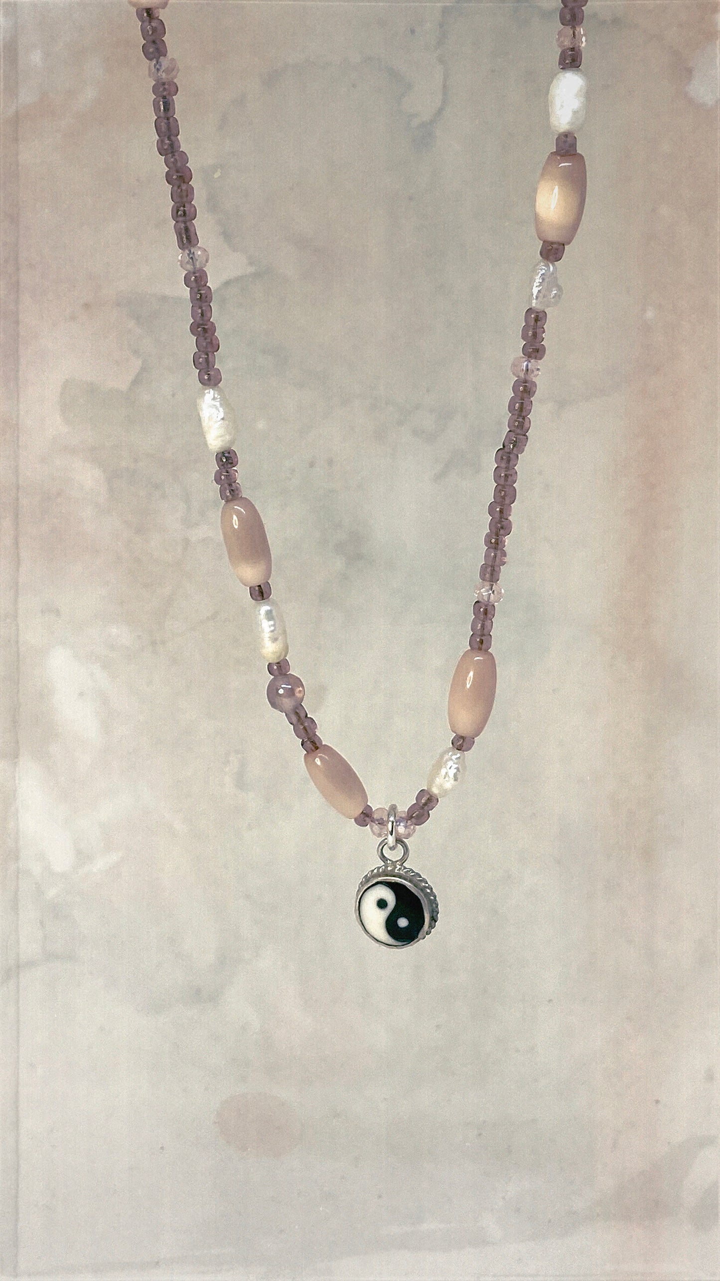 vintage silver enamel yin yang with moonglow lucite and freshwater pearl