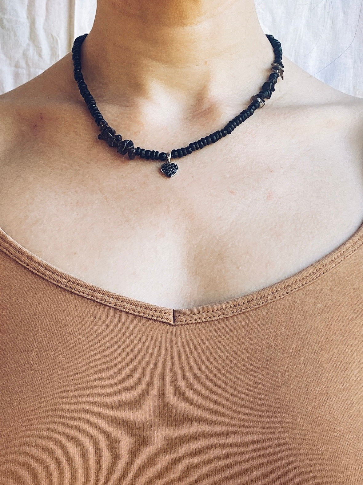 smoky quartz and dark glass with vintage heart charm