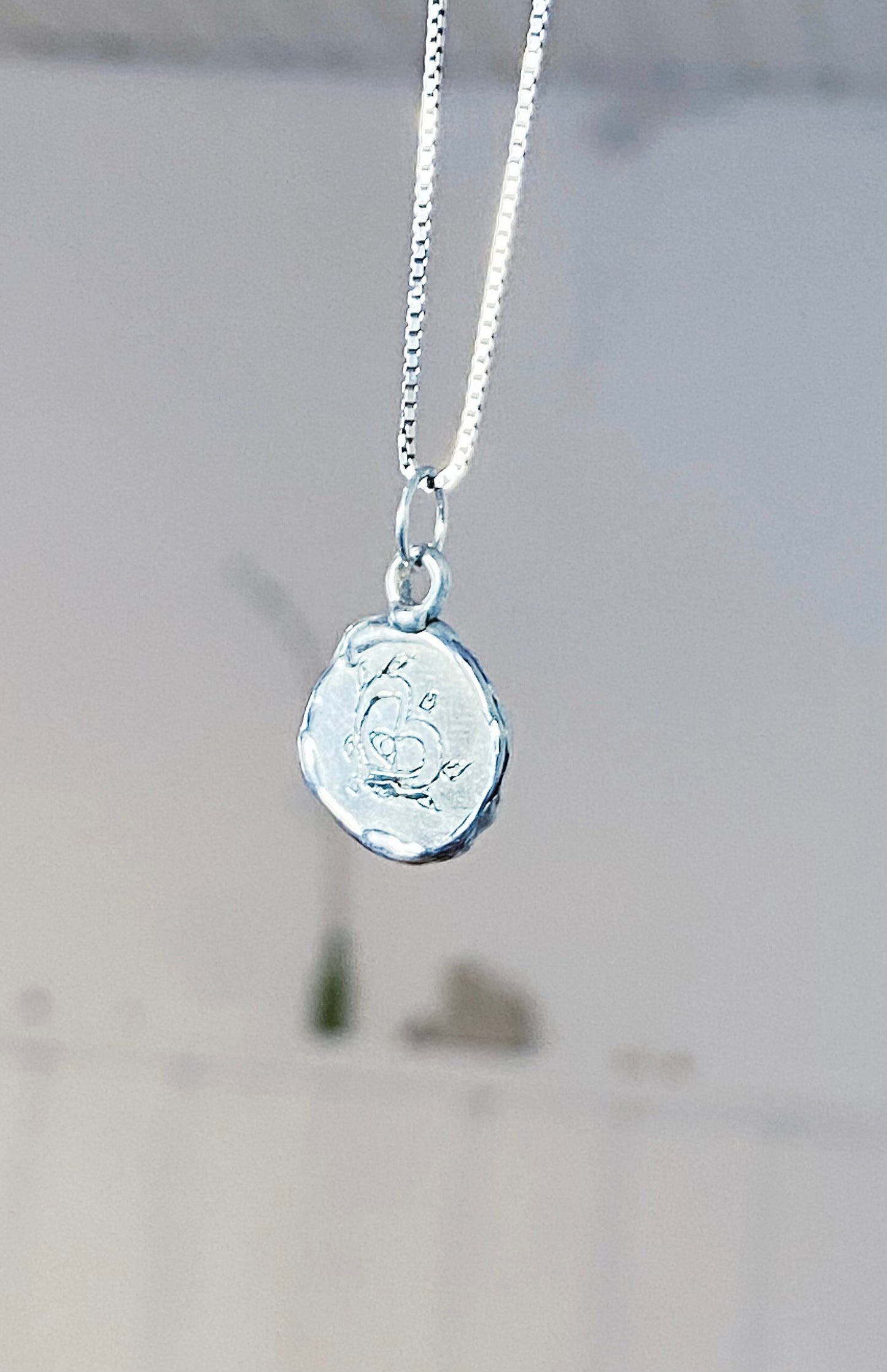 stretching moon kitty I // silver coin one of a kind medallion