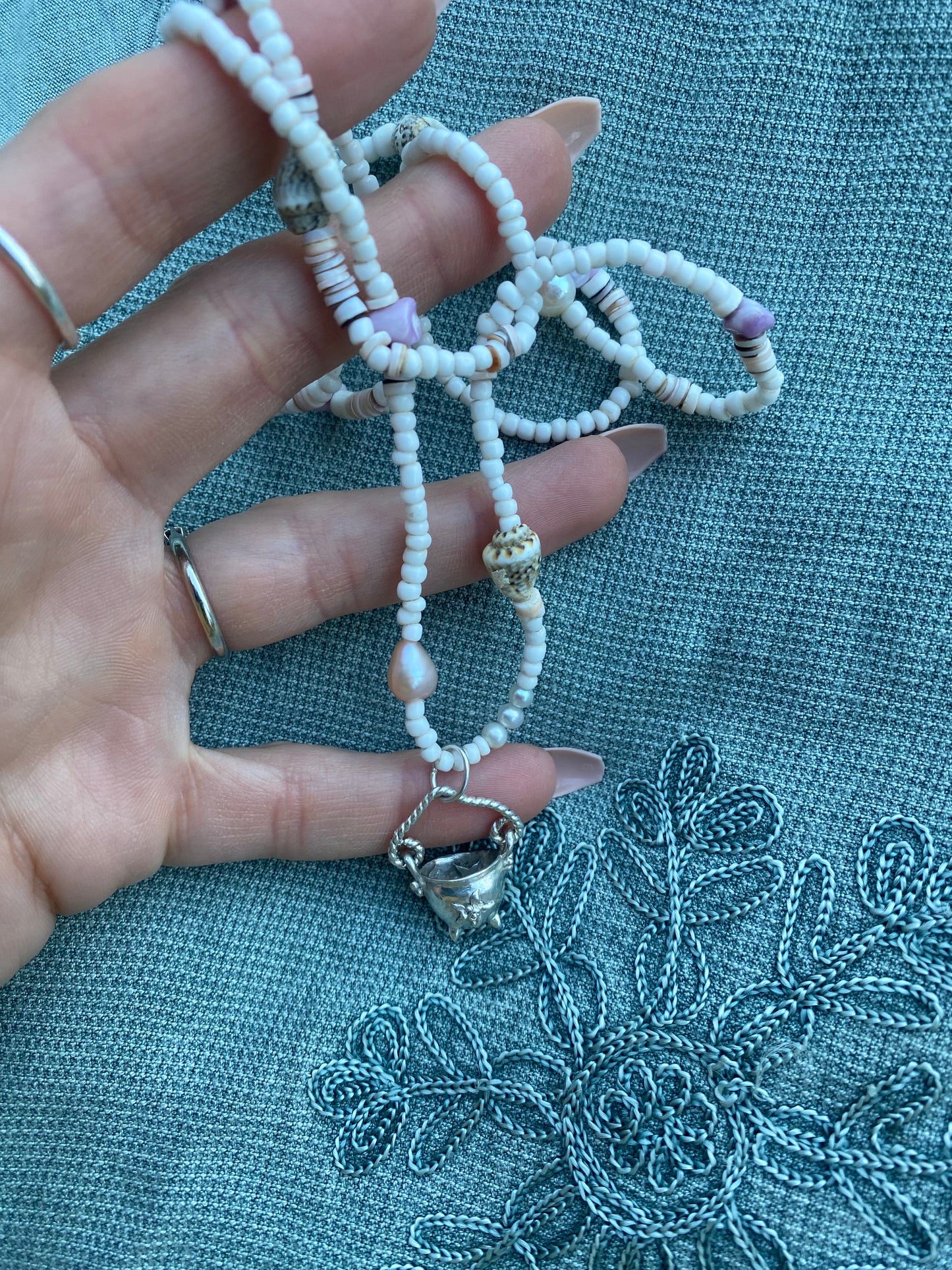 (reserved) shining sea // luminescent silver cauldron on beaded string