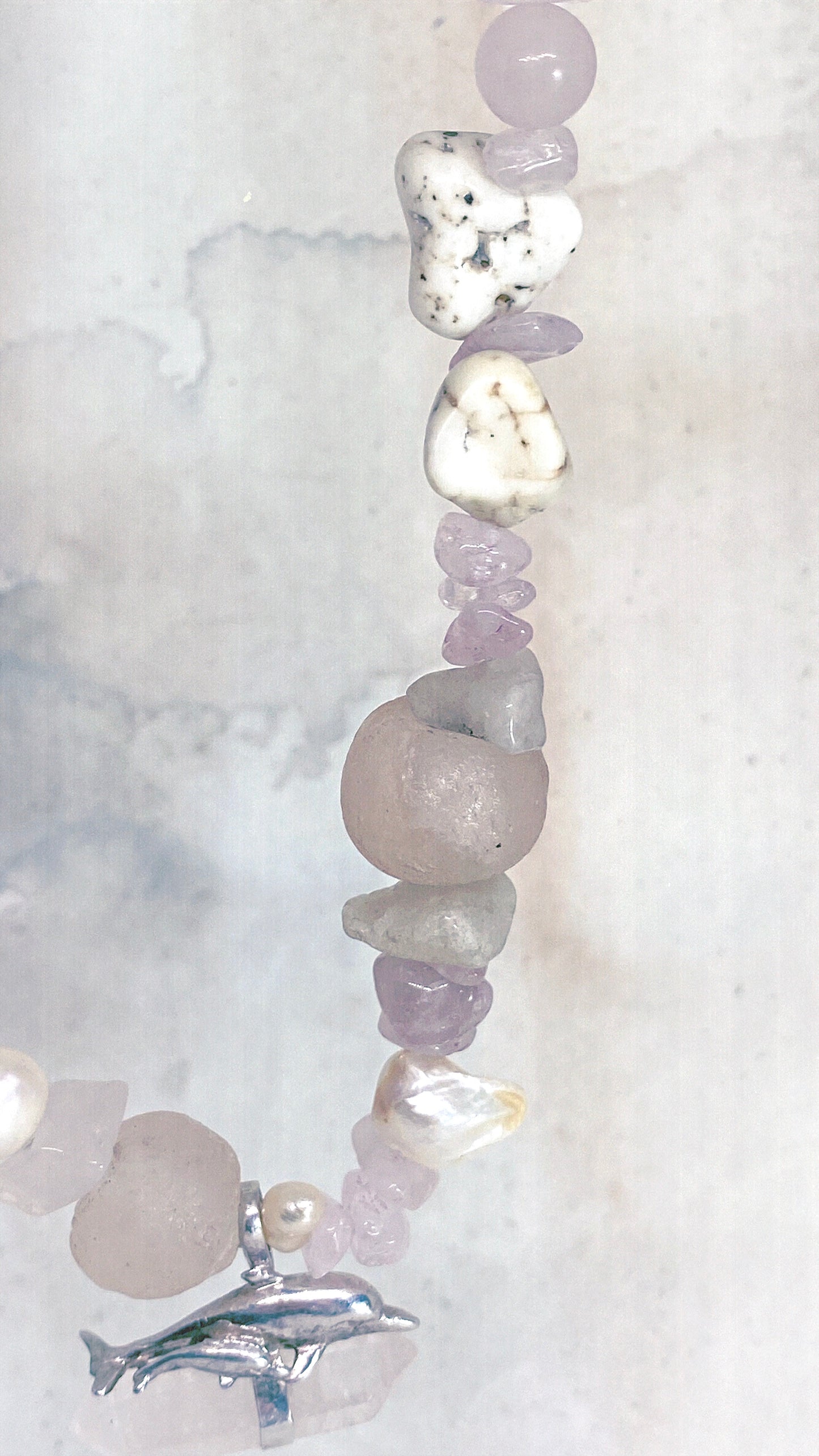 vintage silver dolphin mother and child pair with rose quartz on chunky, organic strand