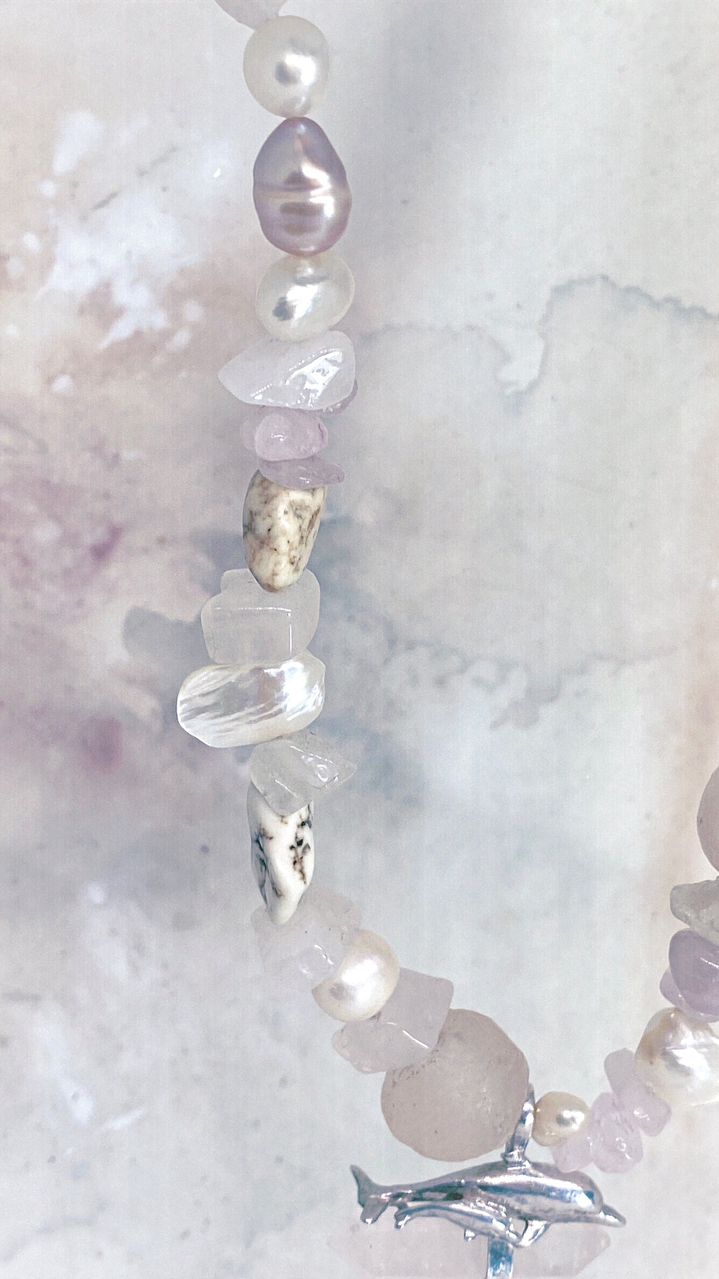 vintage silver dolphin mother and child pair with rose quartz on chunky, organic strand