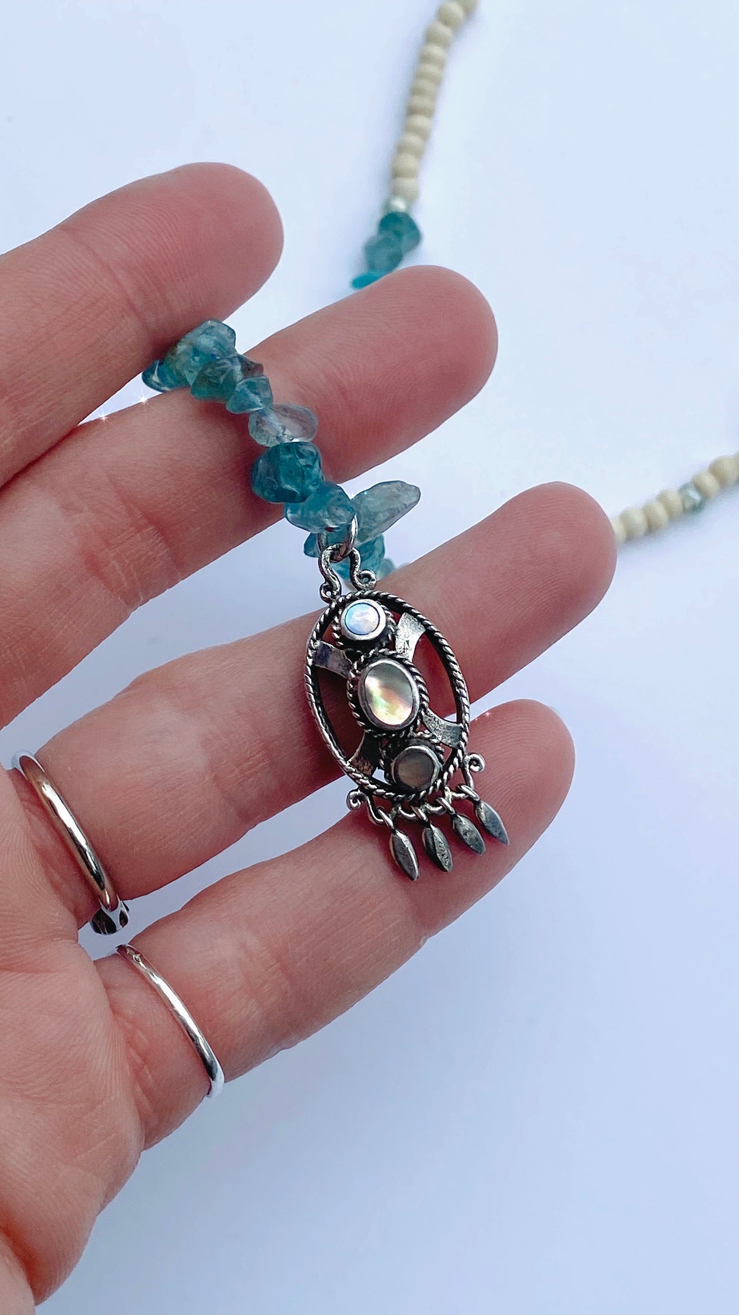 apatite and glass strand with vintage triple abalone pendant