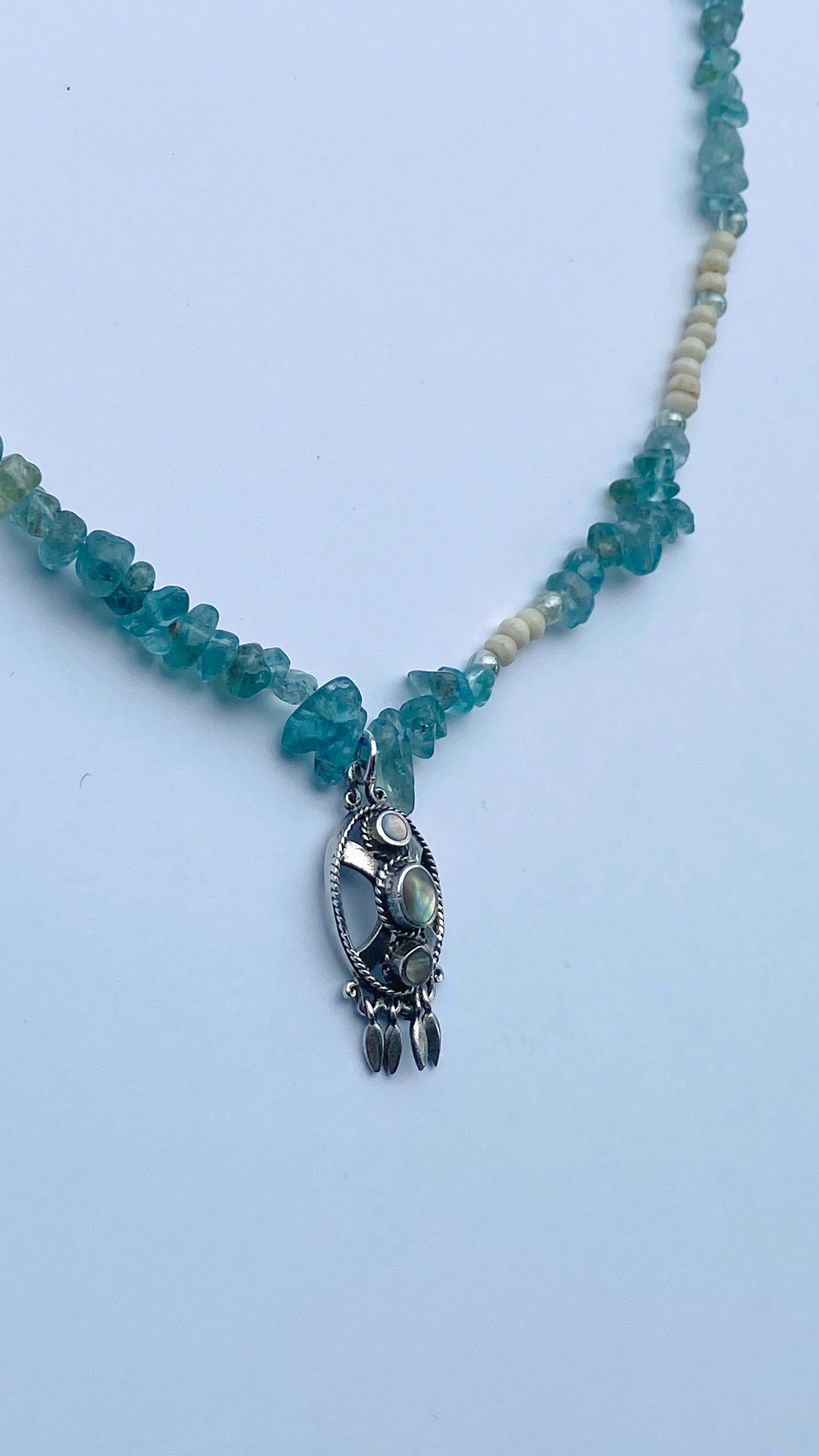 apatite and glass strand with vintage triple abalone pendant