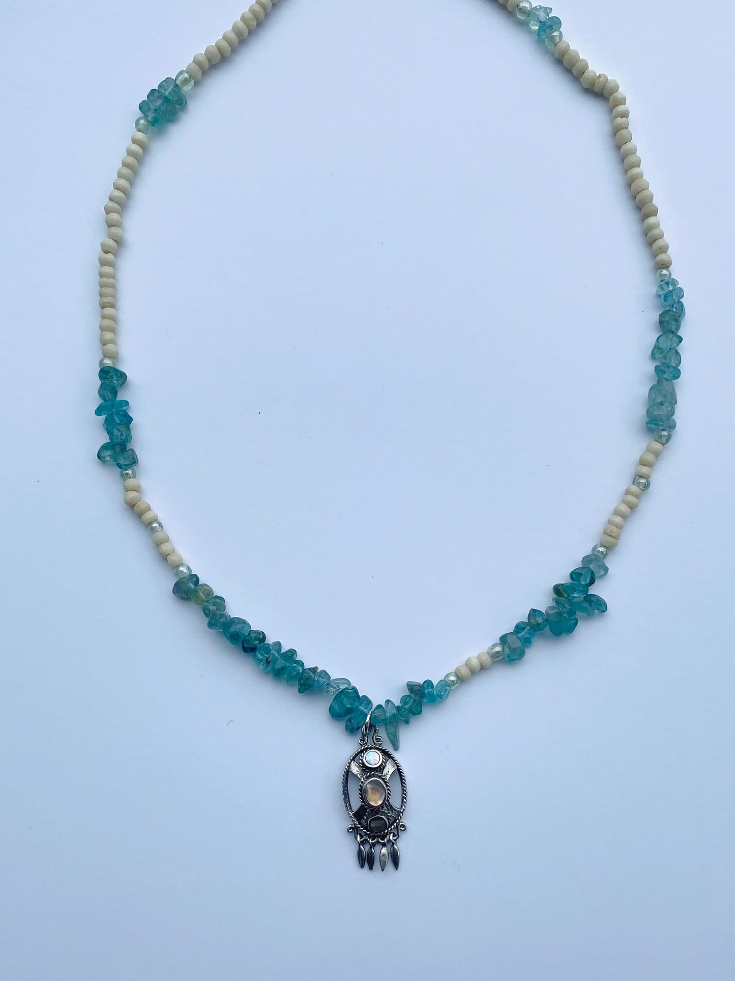 apatite and glass strand with vintage triple abalone pendant
