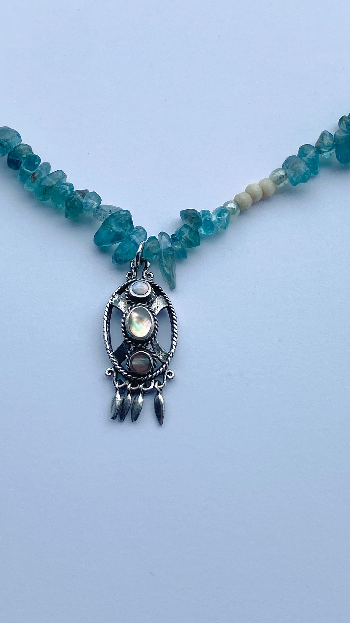 apatite and glass strand with vintage triple abalone pendant