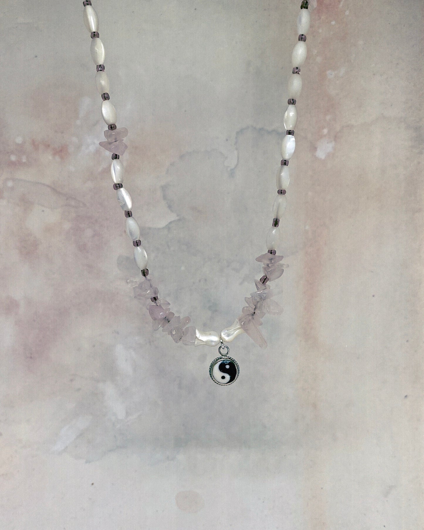 vintage yin & yang with rose quartz and luminous seashell rice