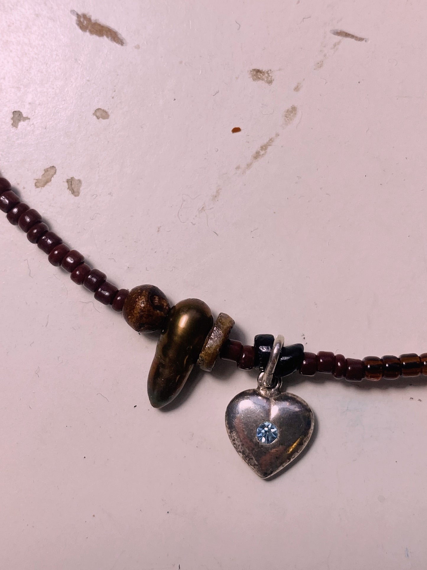 beaded vintage heart charm with blue stone