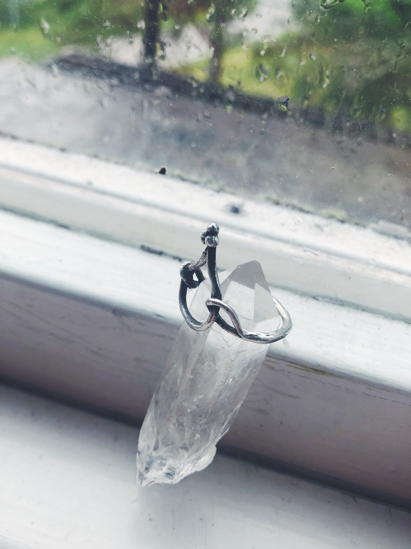 true coil // circle in circles ligature ring