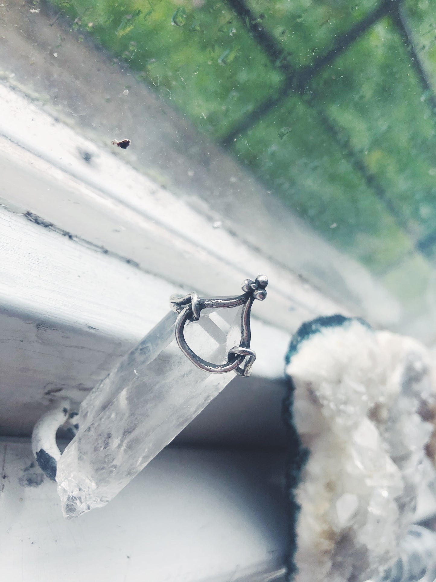 true coil // circle in circles ligature ring