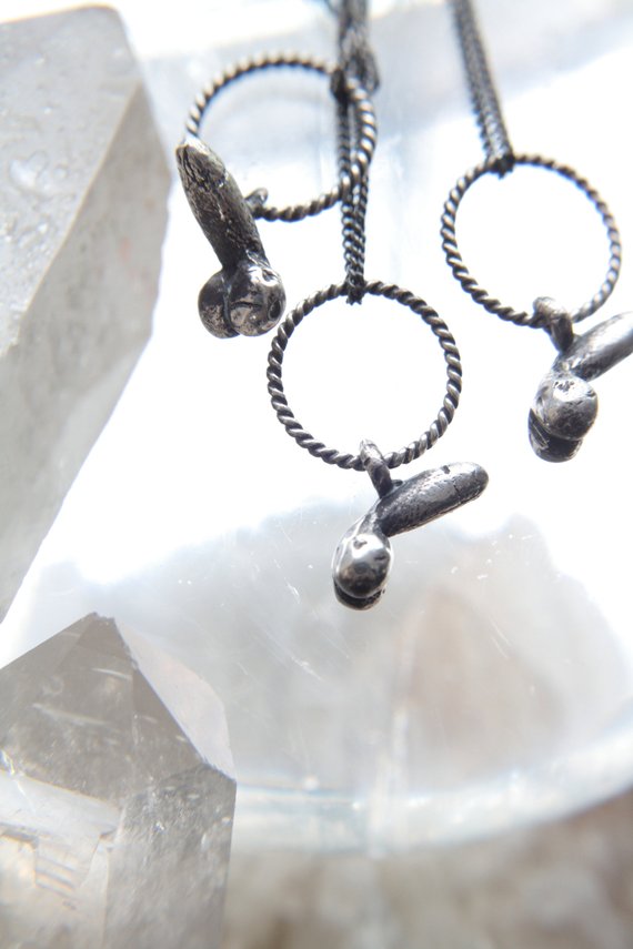 mini d charm // 'minor rustic fertility god'