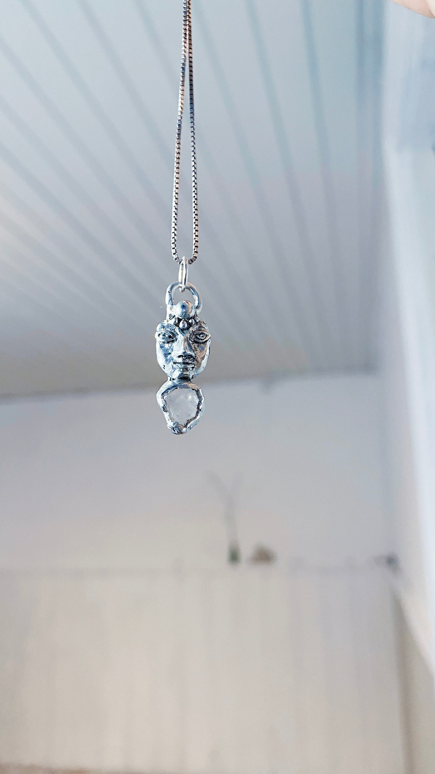 crystal gaze I // silver coin of a kind medallion