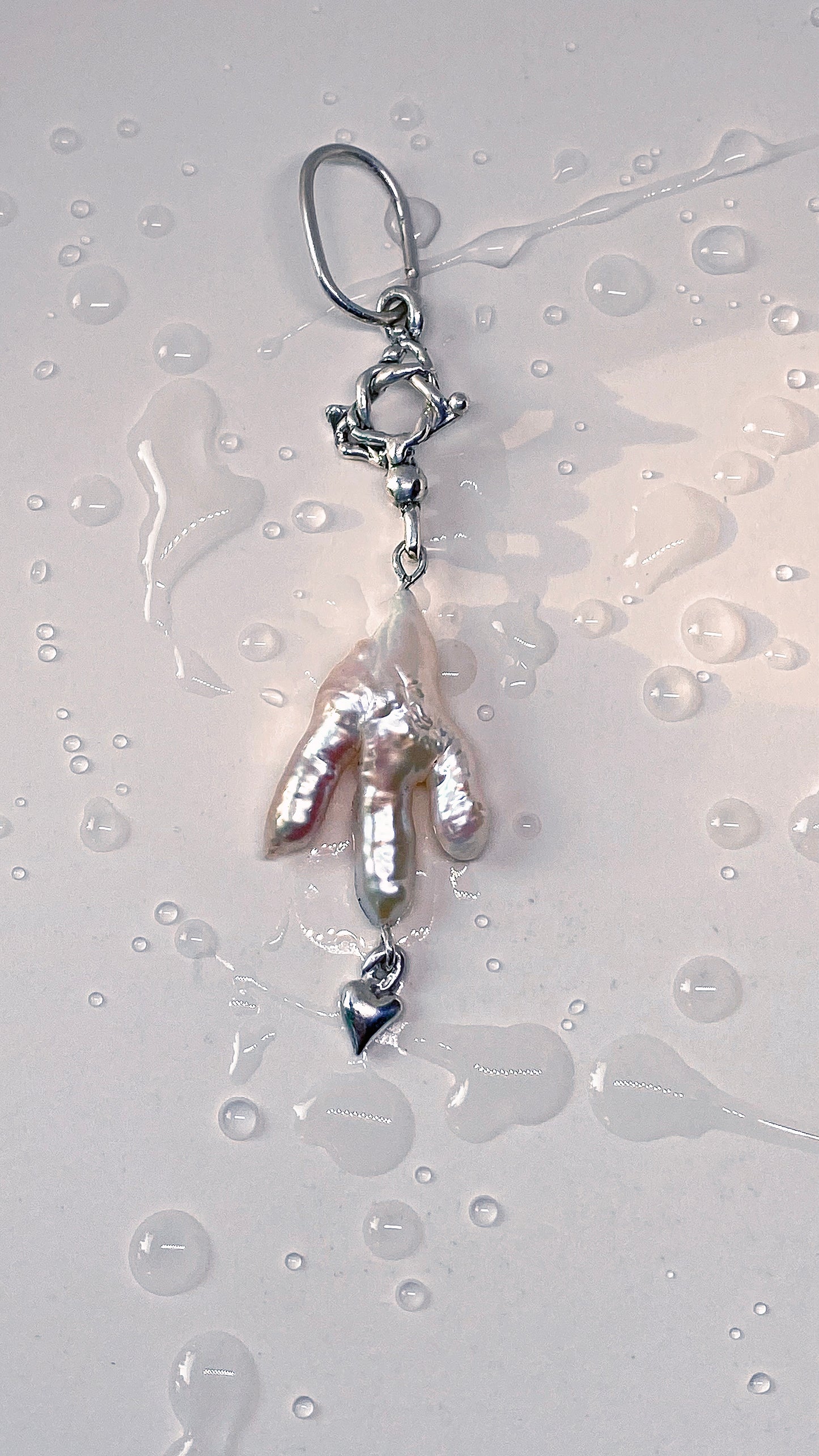 ᠅ sunken city ᠅ keshi prong pearl with circle coil and mini heart