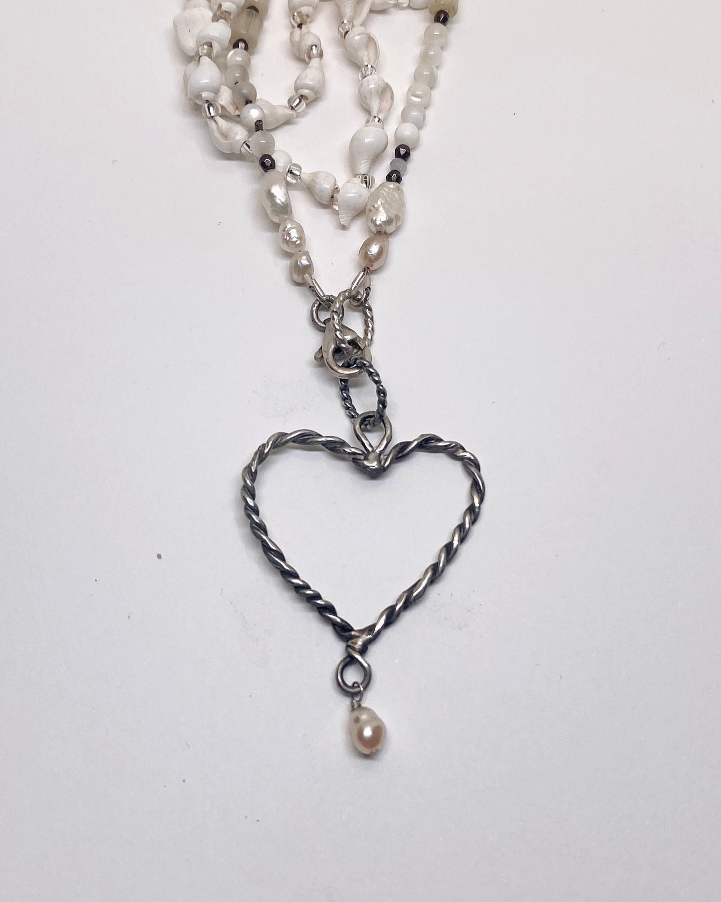 coil heart pearl droplet with seashells and gemstone