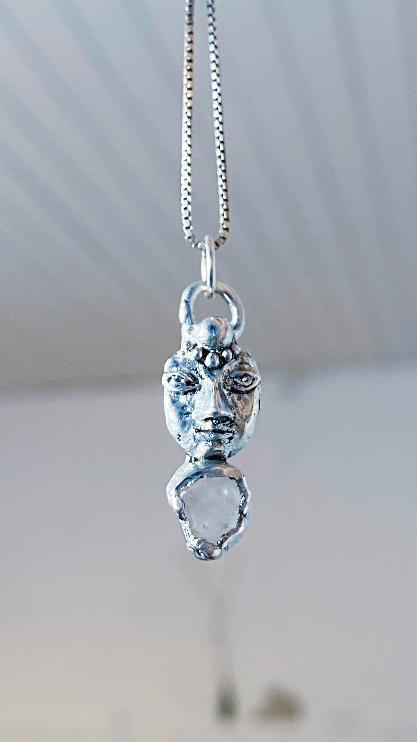 crystal gaze I // silver coin of a kind medallion