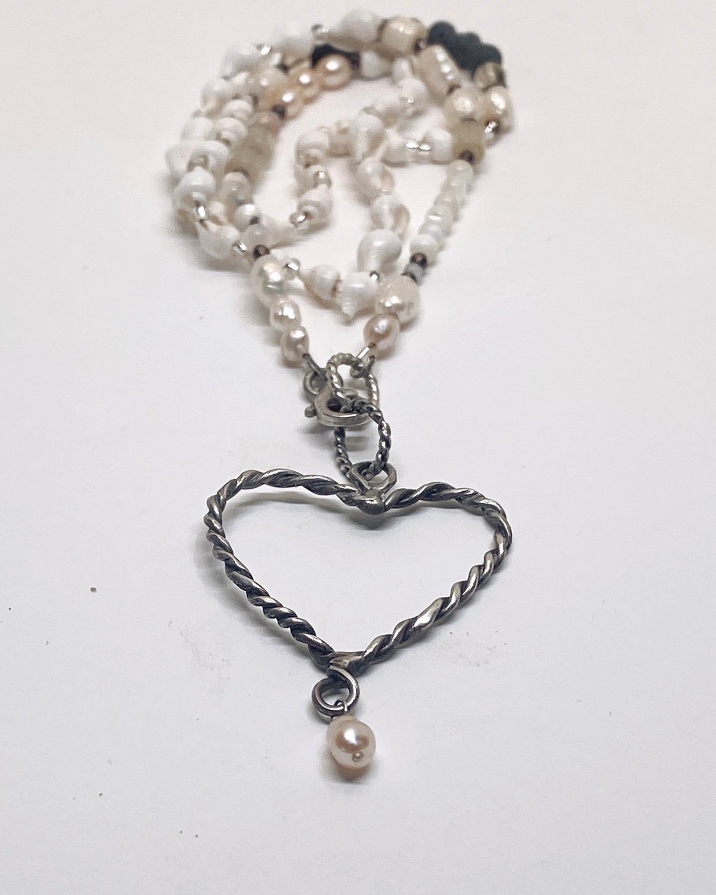 coil heart pearl droplet with seashells and gemstone