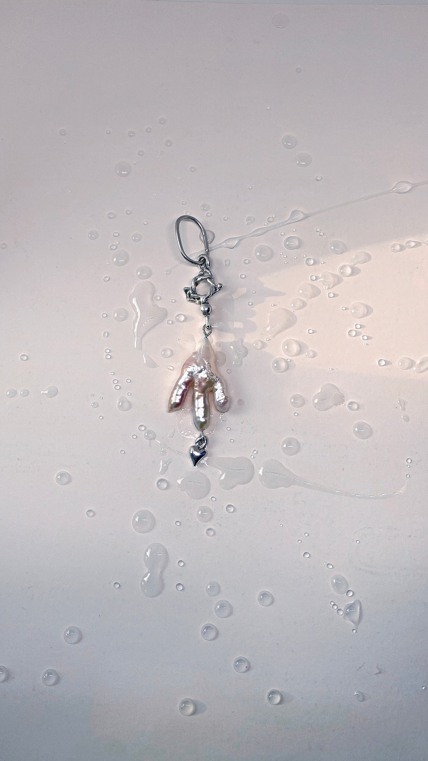 ᠅ sunken city ᠅ keshi prong pearl with circle coil and mini heart
