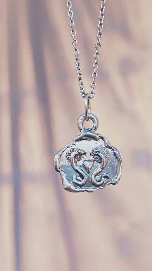 love sneks II // one of a kind silver coin double serpent charm