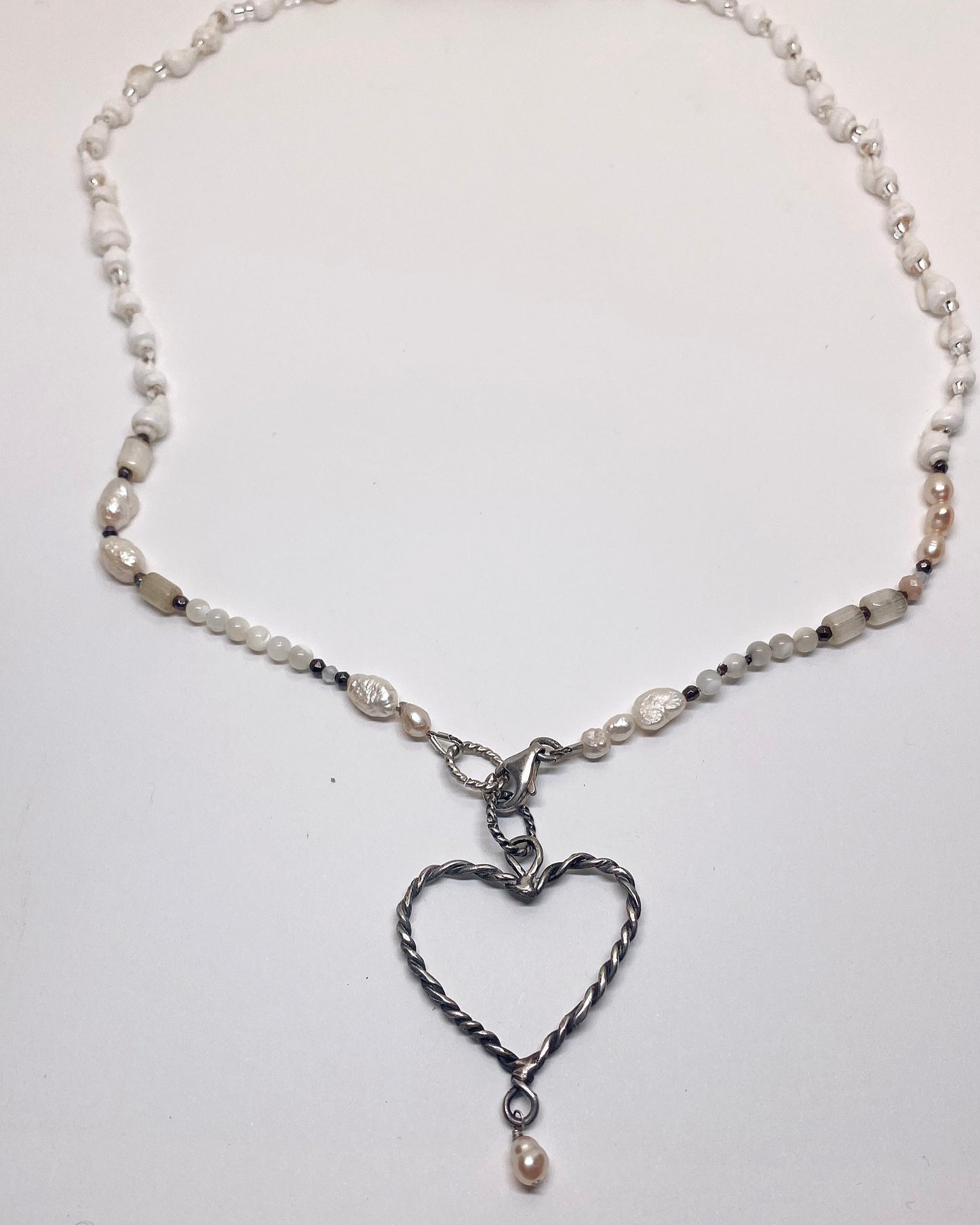 coil heart pearl droplet with seashells and gemstone