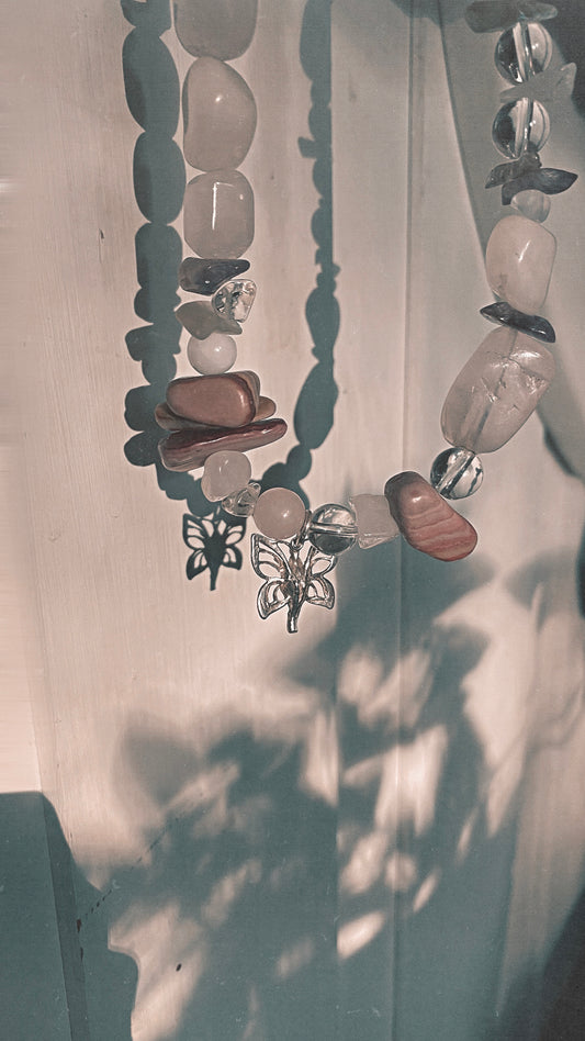 silver moth pendant on chunky textured strand