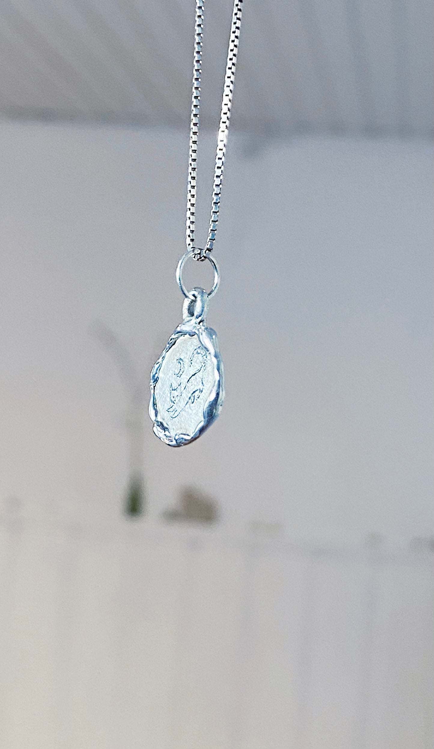 stretching moon kitty I // silver coin one of a kind medallion