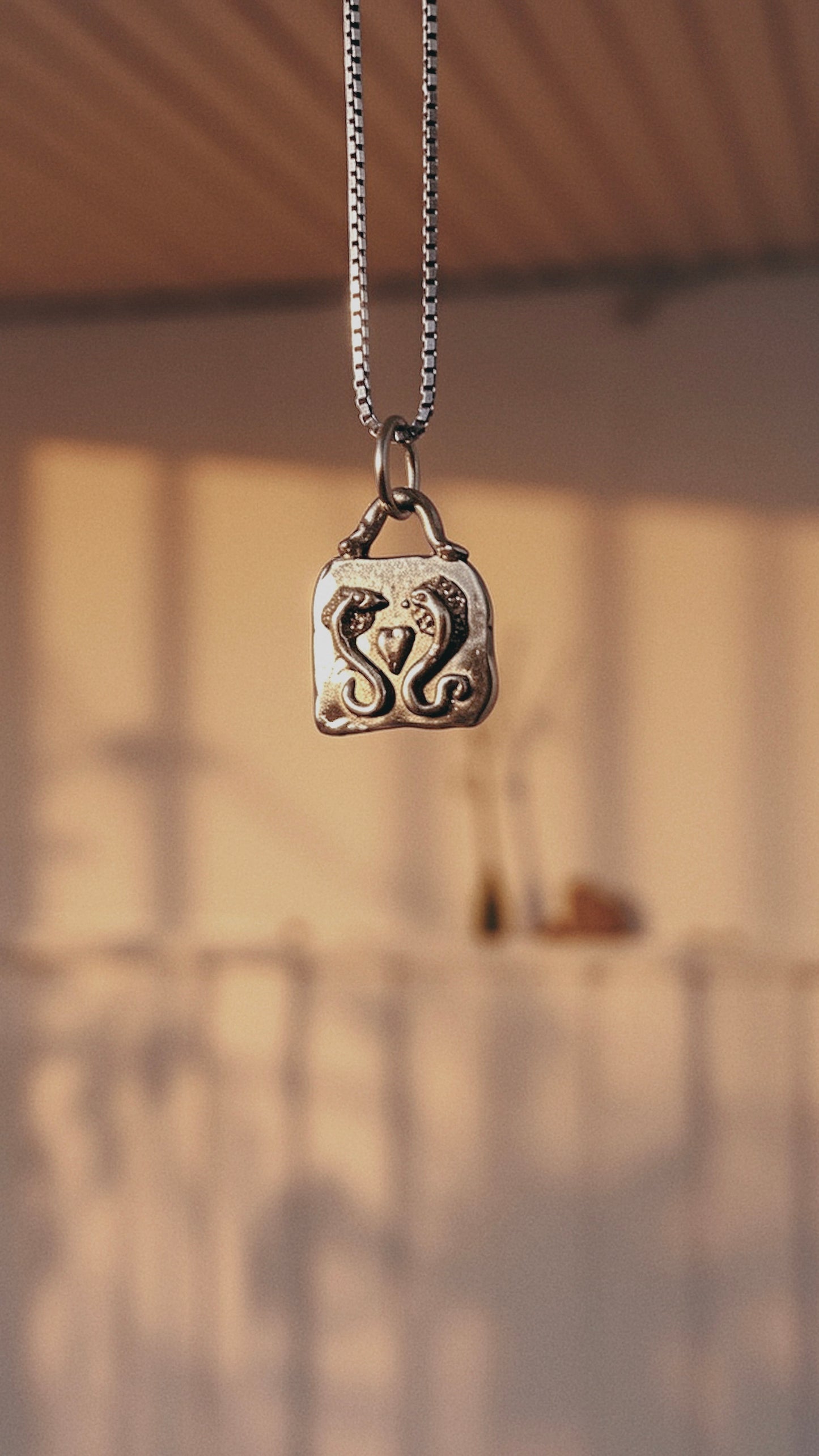 love sneks I // one of a kind promise heart serpent rectangular brass medallion