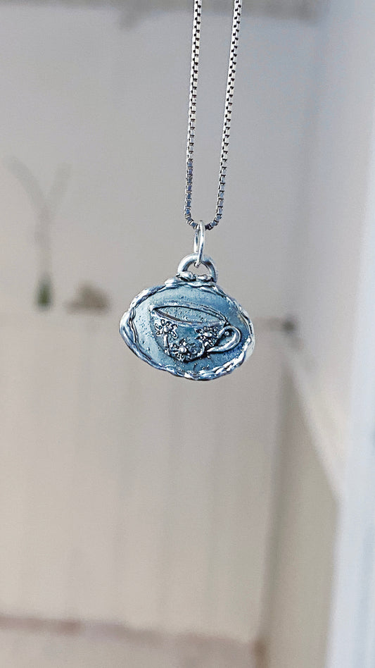 tea cup I // silver coin one of a kind medallion