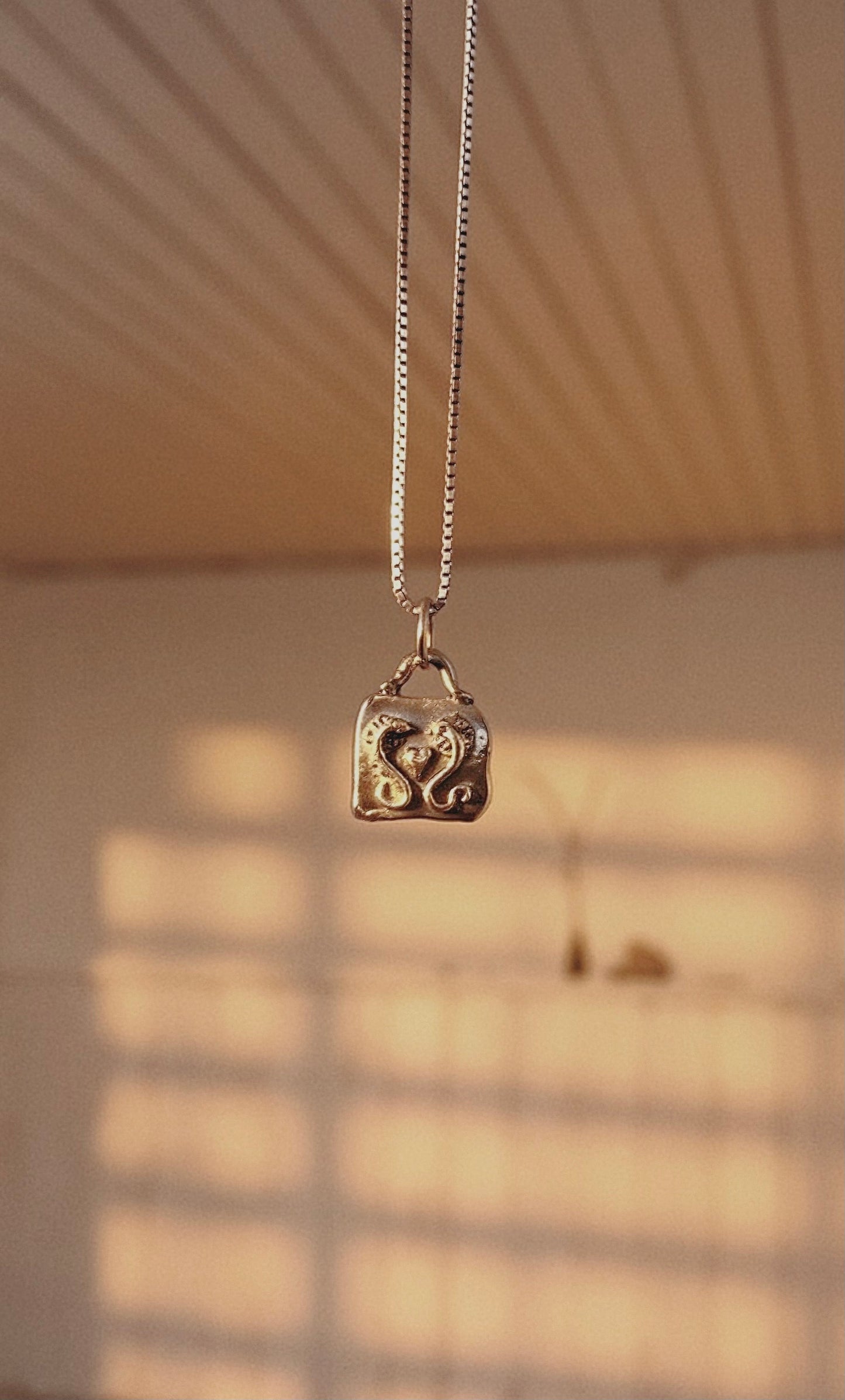 love sneks I // one of a kind promise heart serpent rectangular brass medallion