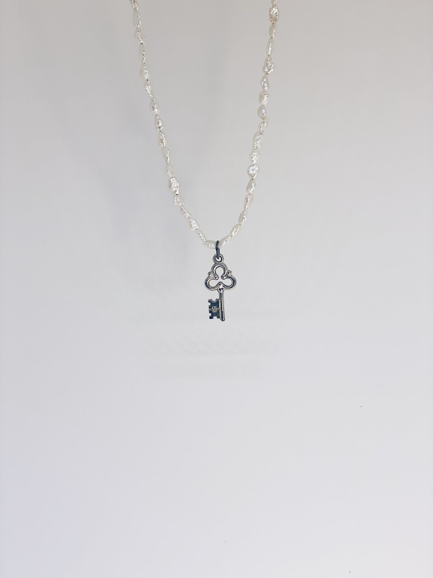 vintage key charm and fresh water pearl necklace